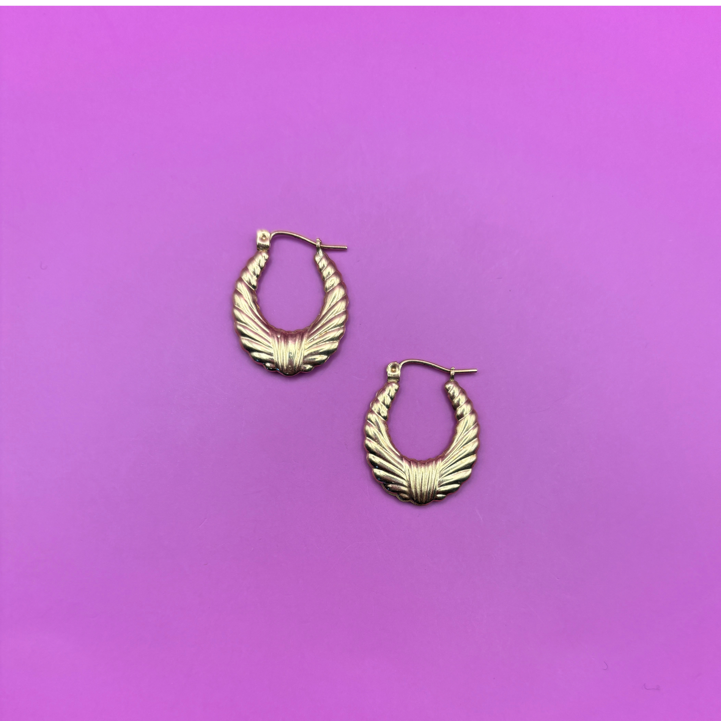 14k tied together hollow croissant hoops