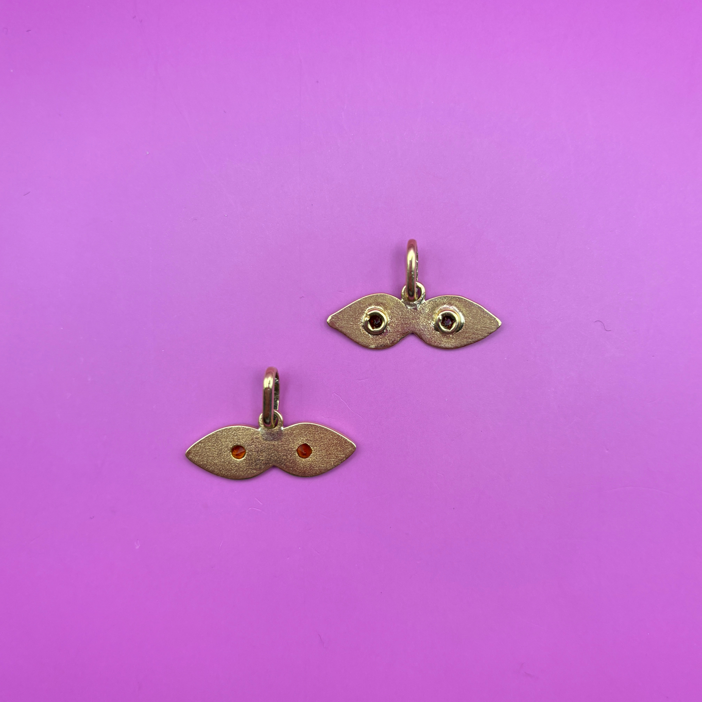 14k garnet eyes charm