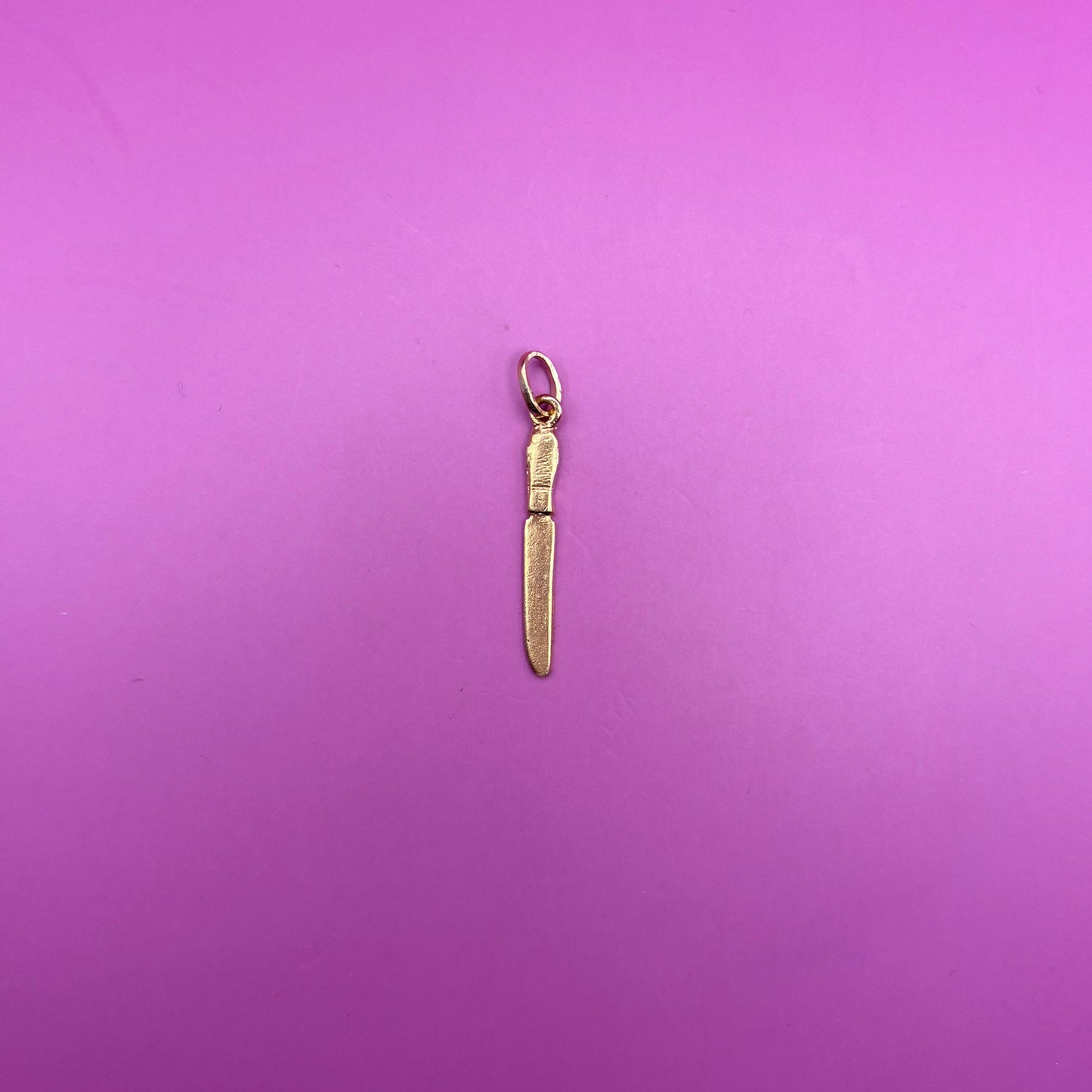 18k knife charm with green enamel handle