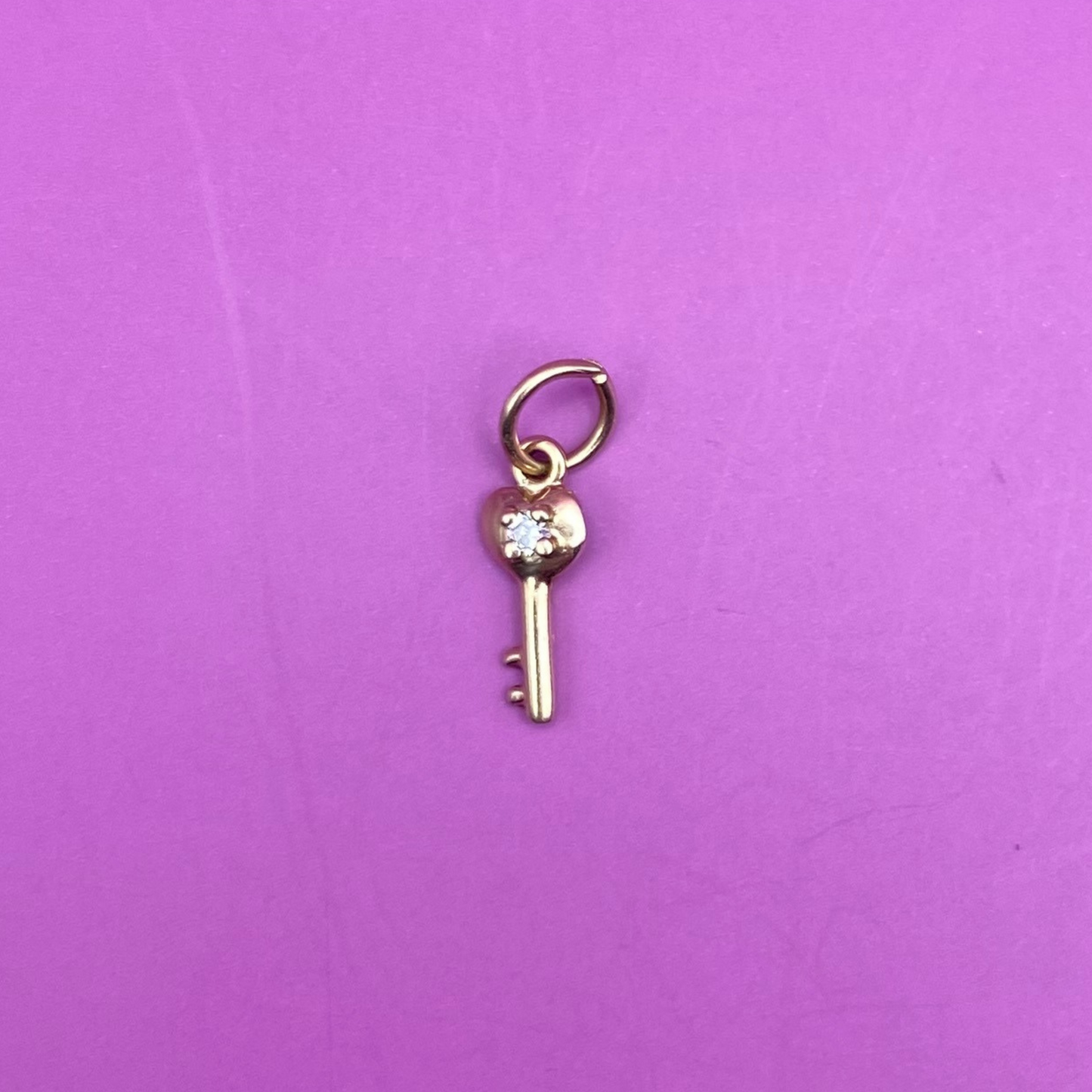 14k mini key with synthetic gem charm