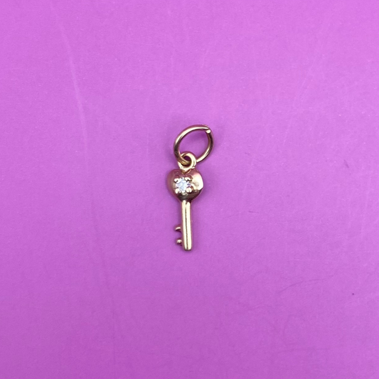 14k mini key with synthetic gem charm