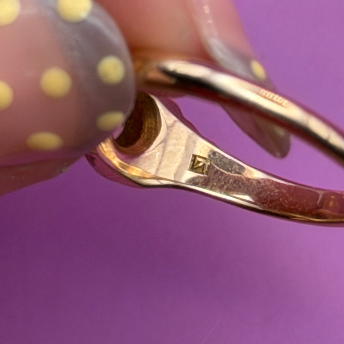 14k eye of the storm ring with peridot