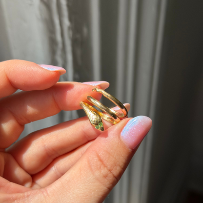 18k wrap around snake ring with tsavorite eyes