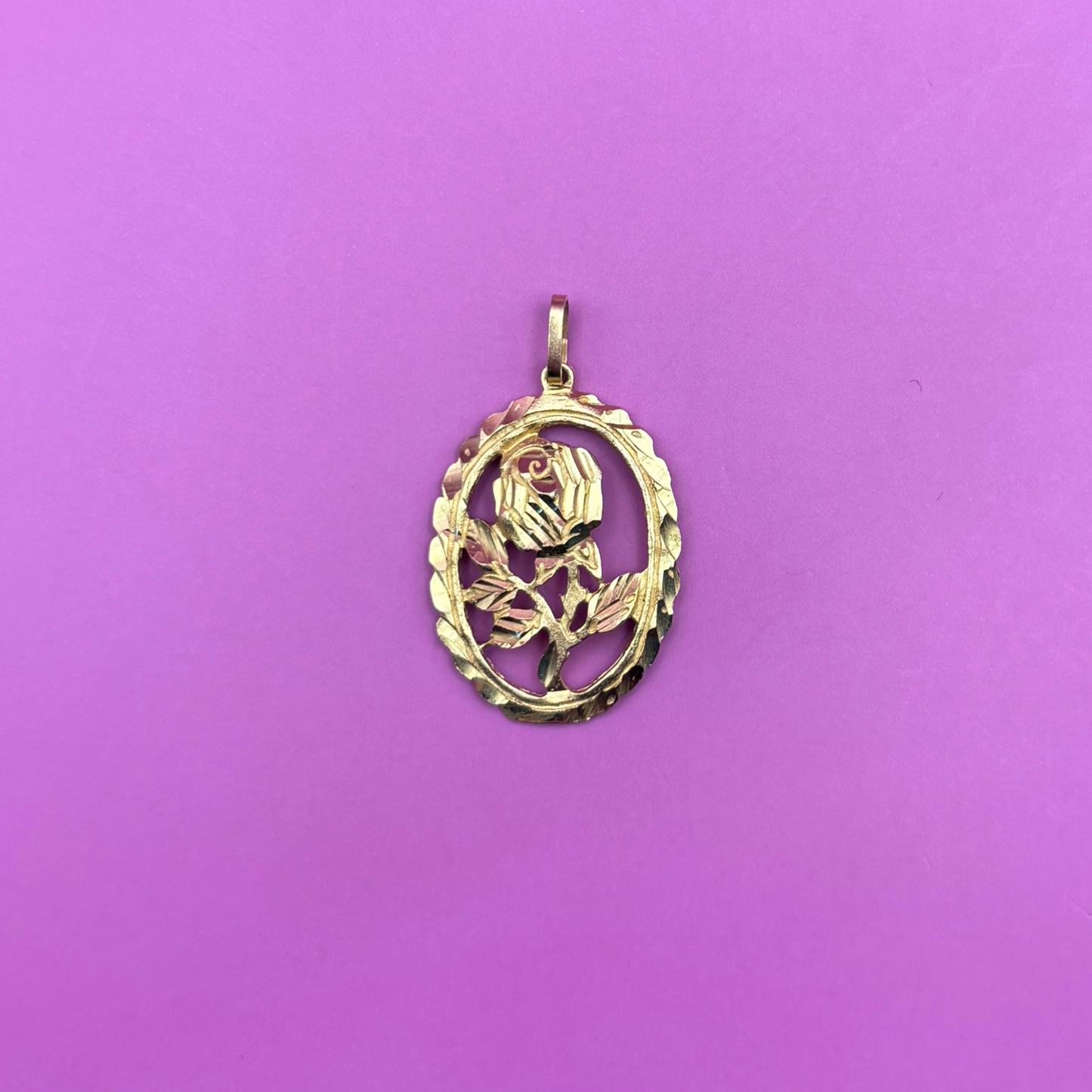 14k larger rose in an oval frame charm