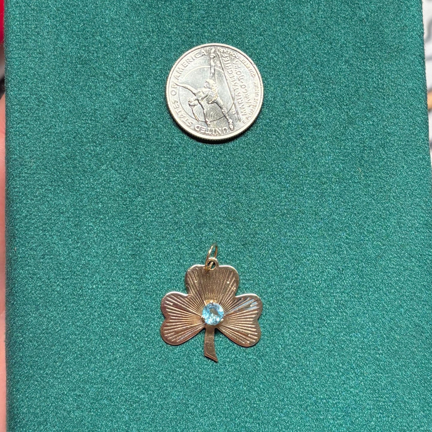 14k engine turned 3 leaf clover with blue topaz charm