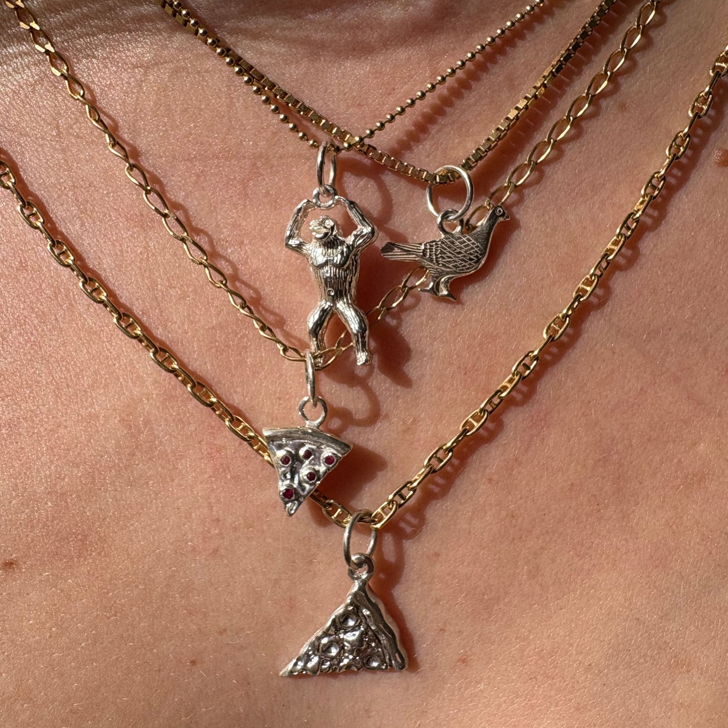 silver pizza with ruby pepperonis charm