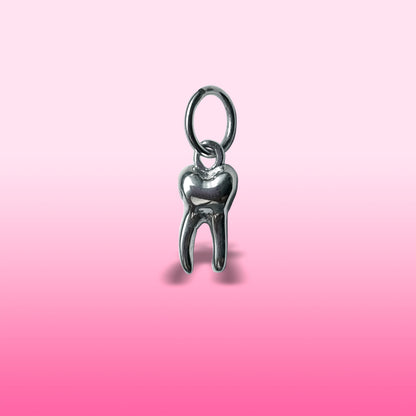 silver baby tooth charm