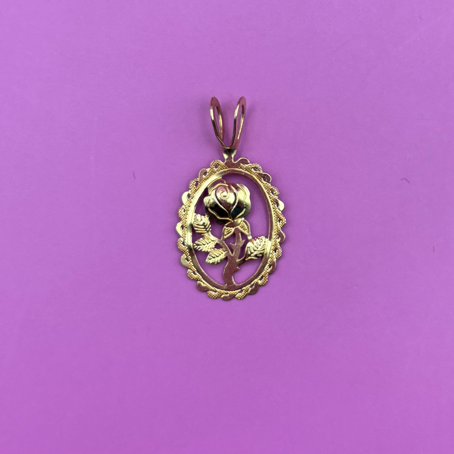 14k smaller rose in an oval frame charm