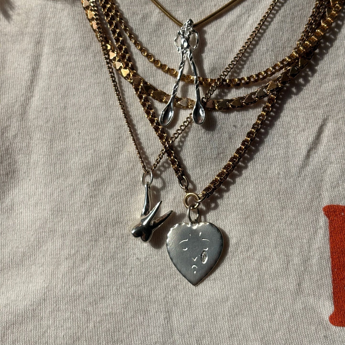 silver tooth pendant