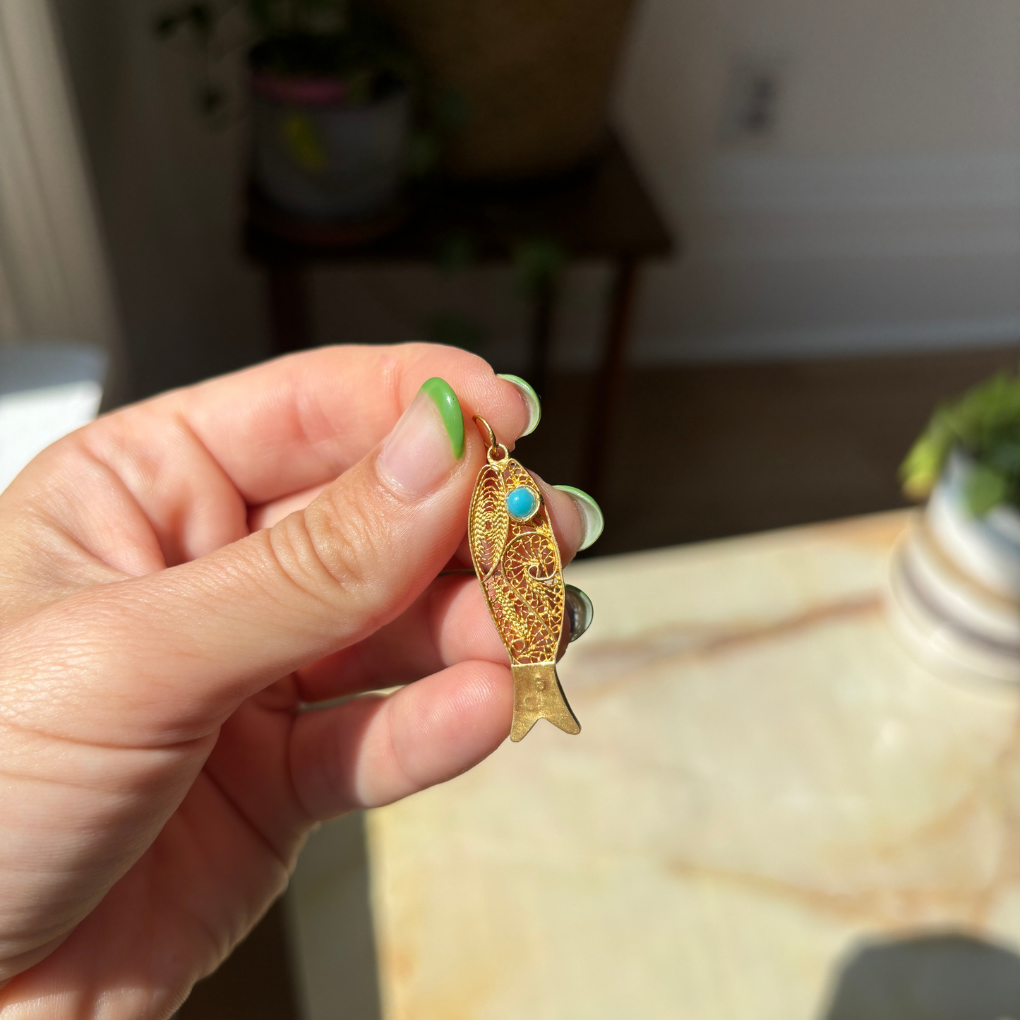 21k 70s filigree fish with synthetic turquoise eye charm