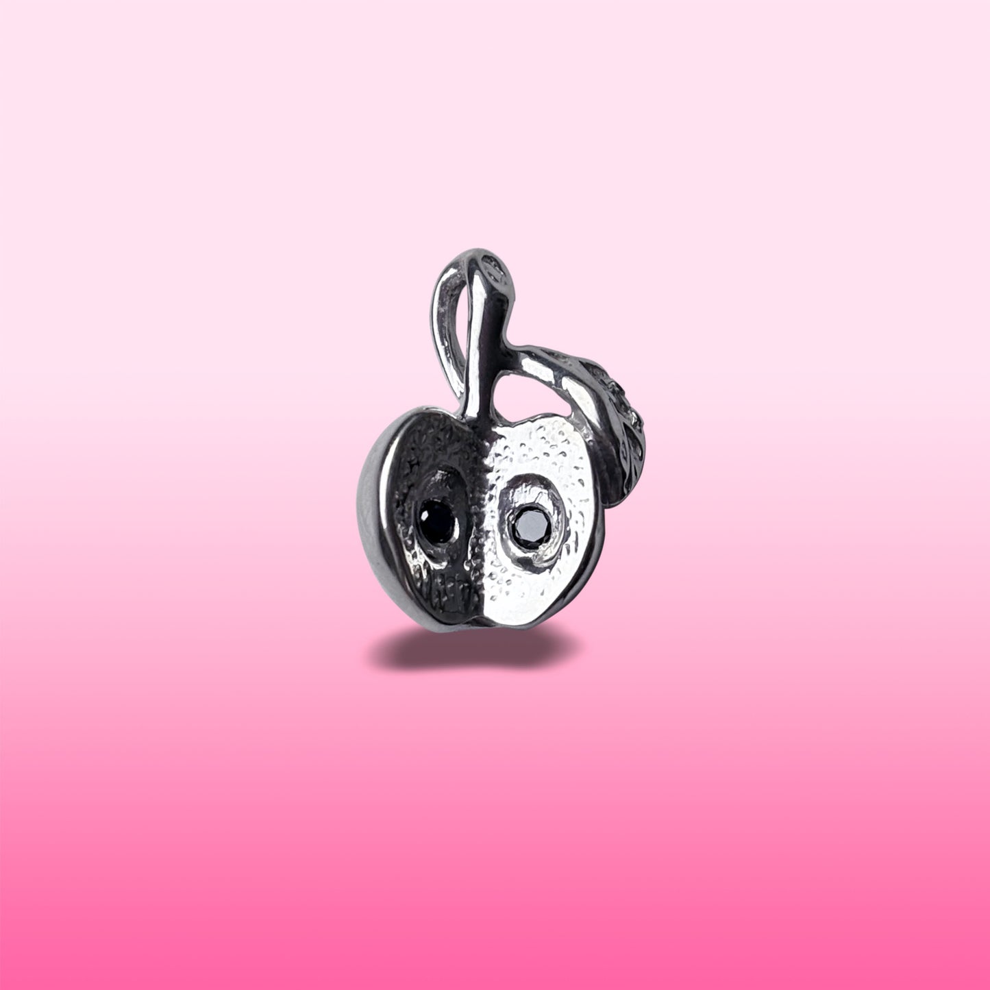 silver big apple with black diamond seeds charm