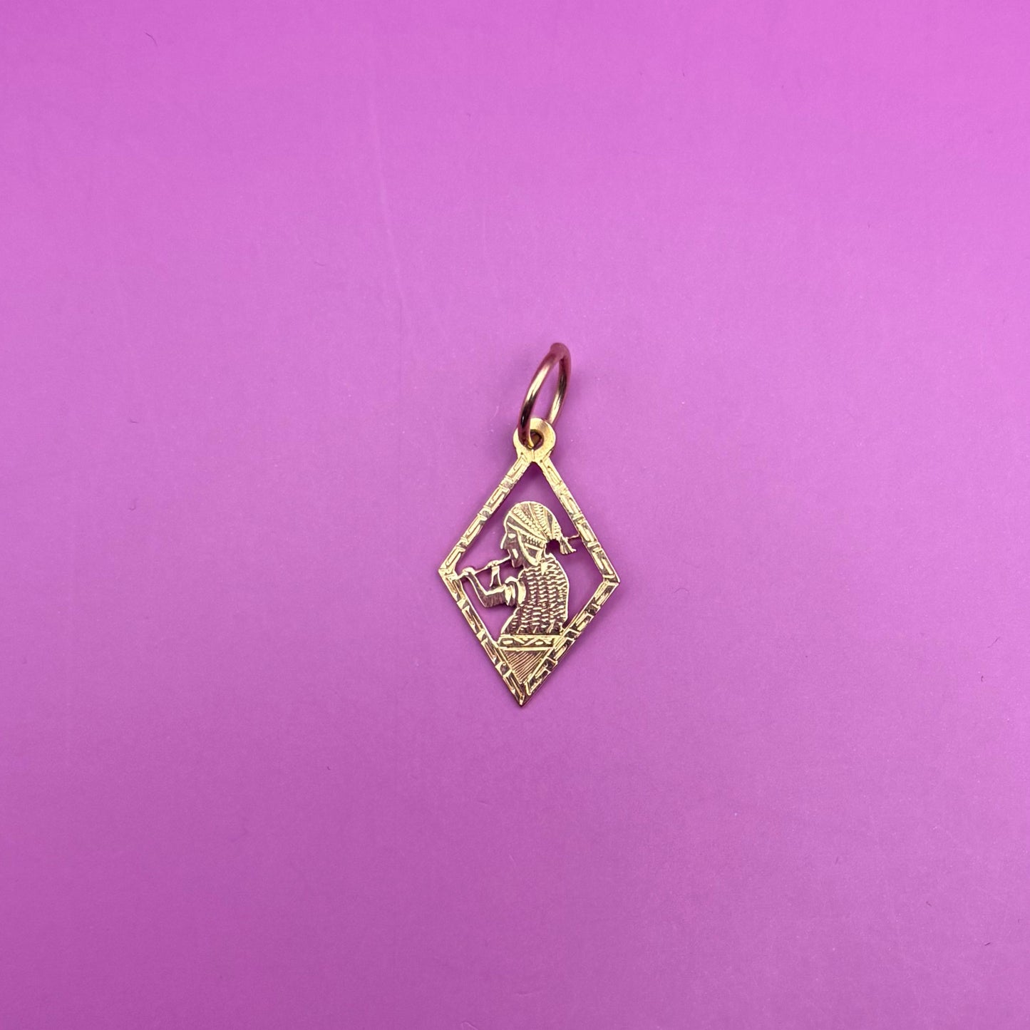 18k meso woman with flute charm