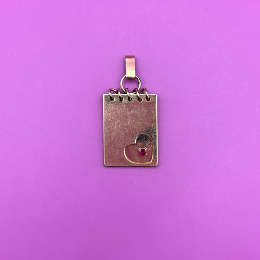 14k notepad with ruby charm