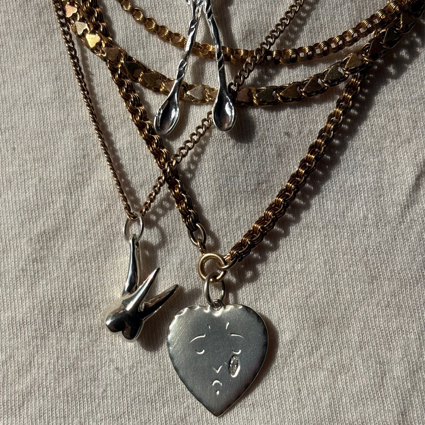 silver crying heart & diamond tear drop pendant