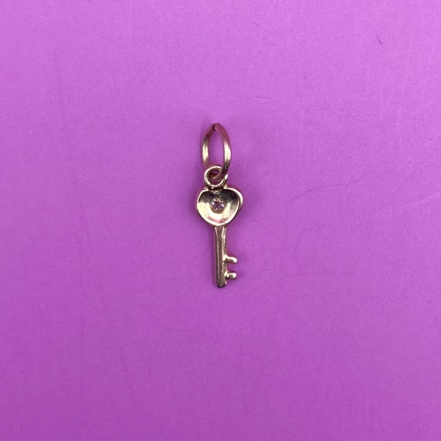 14k mini key with synthetic gem charm