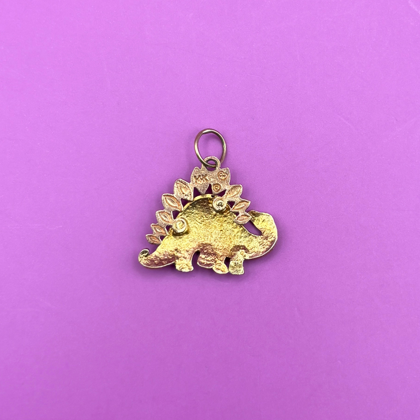 14k stegosaurus charm with rose gold spikes