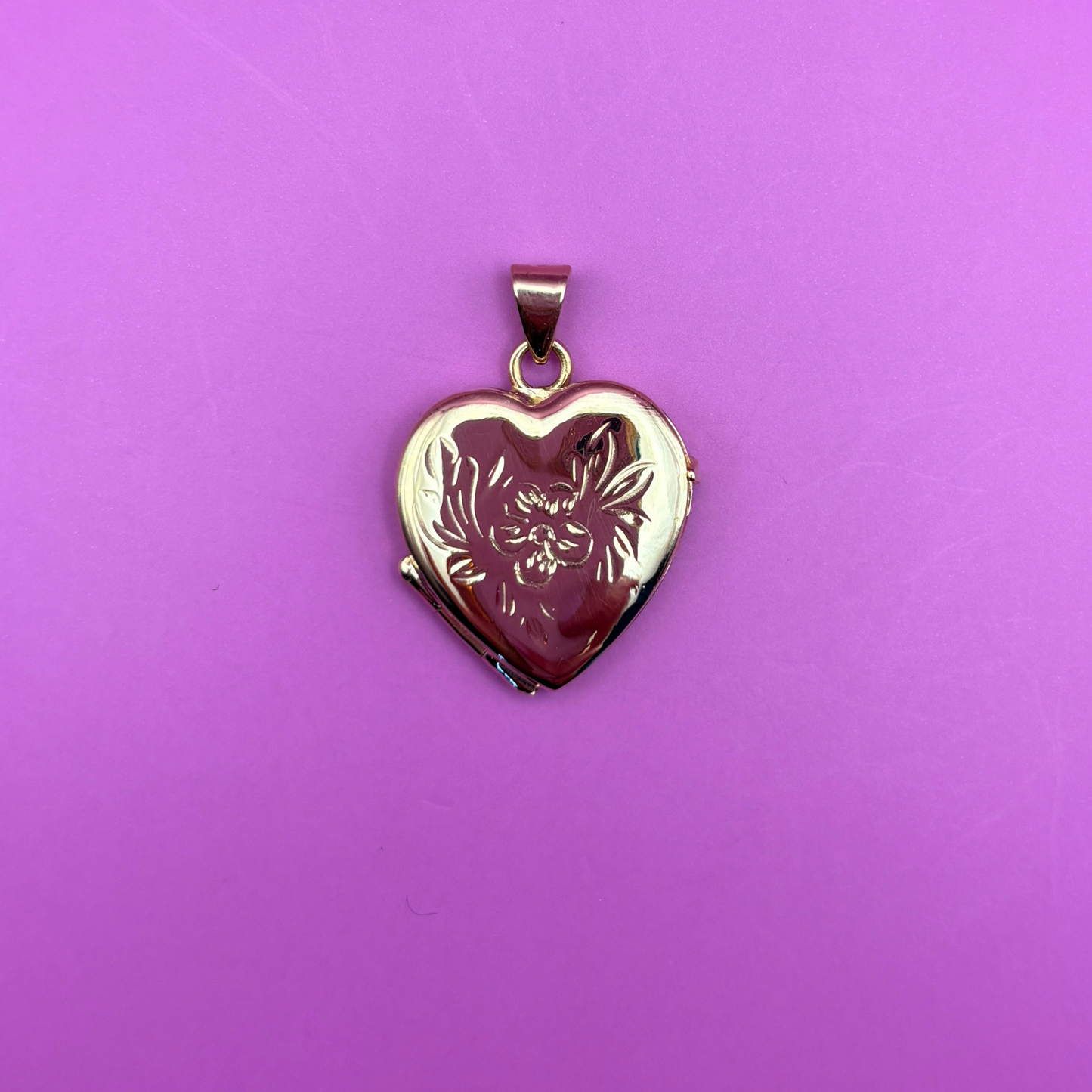 14k heart locket with flower and leaf motif engraving