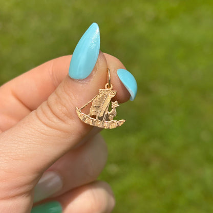 18k meso gondola man charm