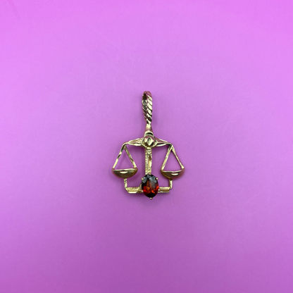 14k libra with garnet stone charm by Michael Anthony