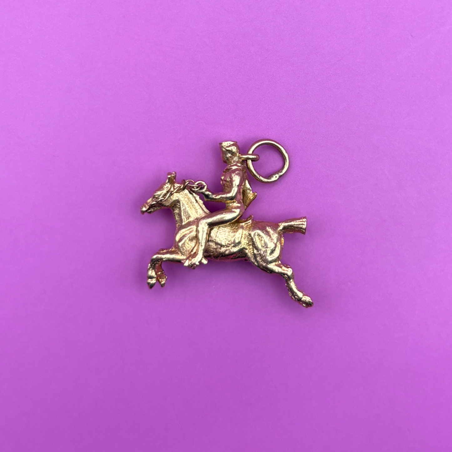 14k horse and rider moving charm