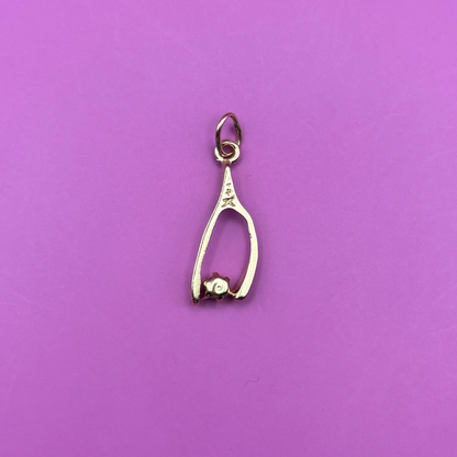 14k wishbone with peridot charm