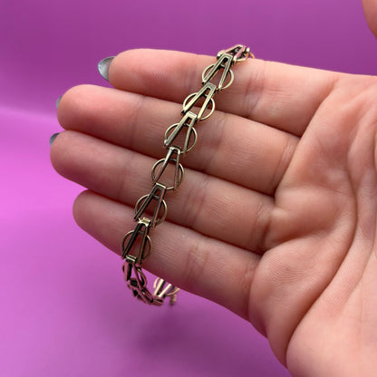 14k fancy mid century link bracelet with safety chain 7 3/8"