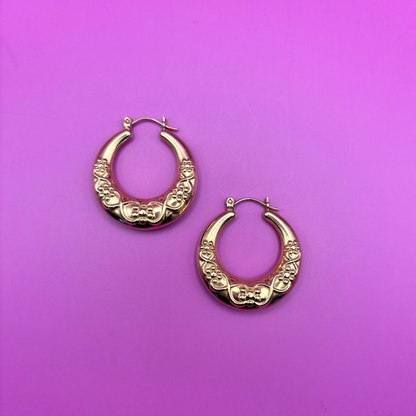 14k hollow hoops with floral pattern