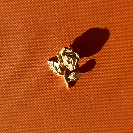 14k rose with hidden bail charm