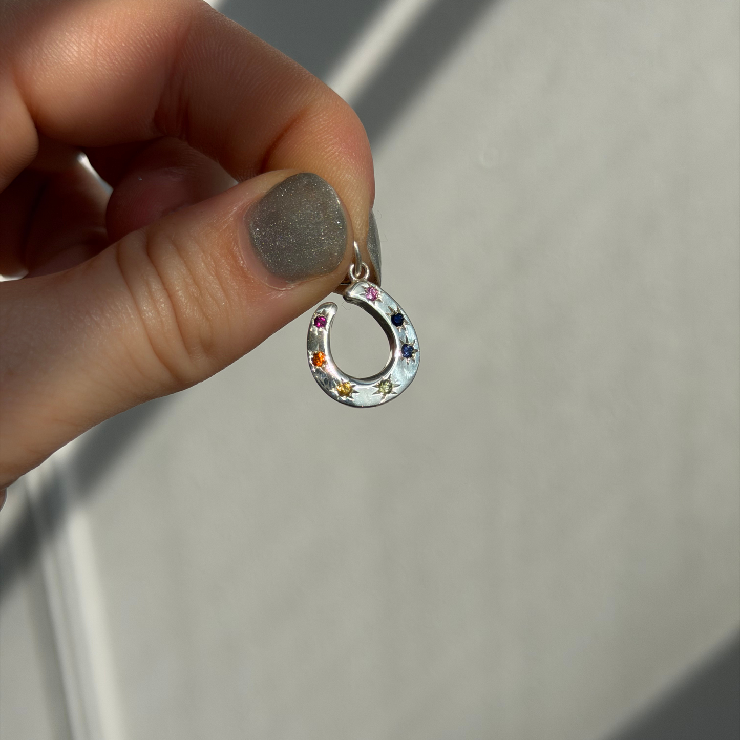 silver 7 rainbow sapphire stars horseshoe charm