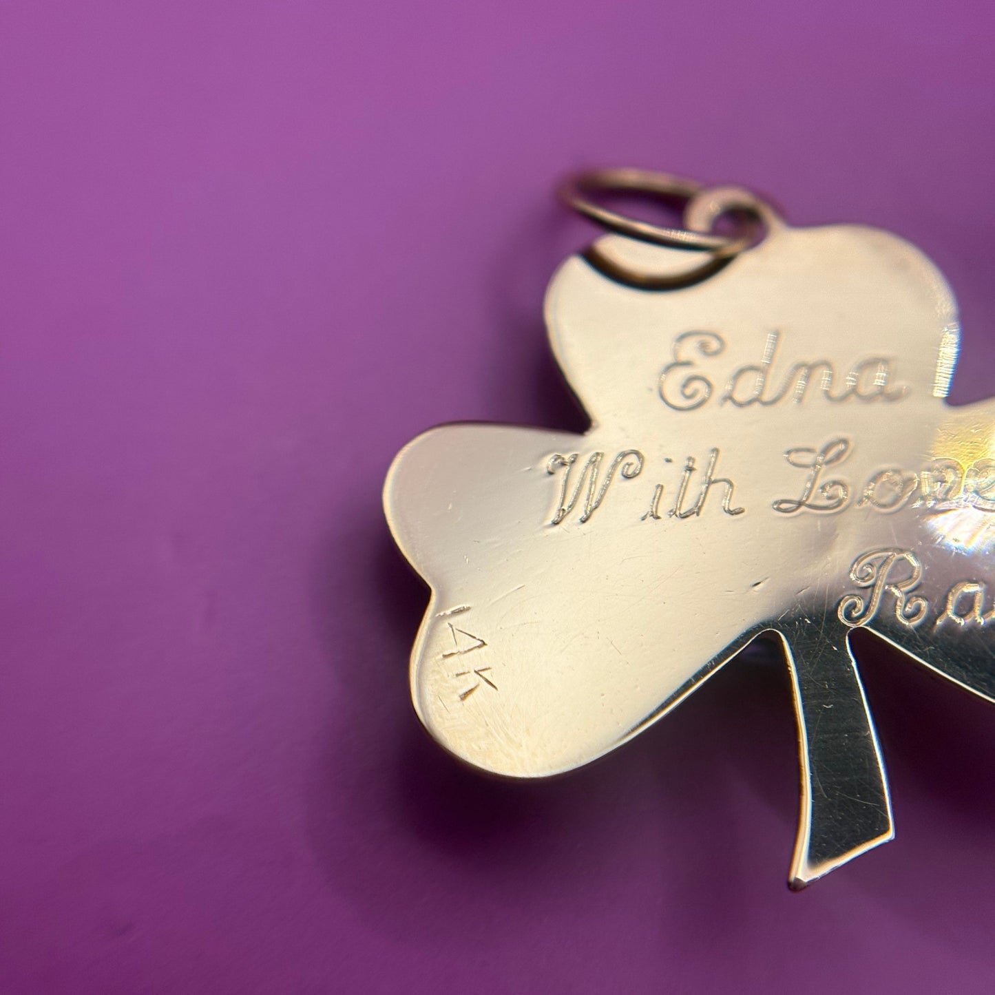 14k engine turned 3 leaf clover with blue topaz charm