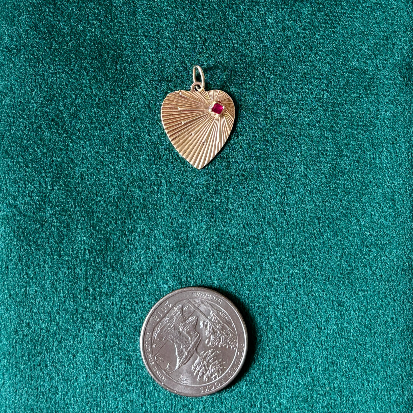 14k engine turned heart with ruby charm