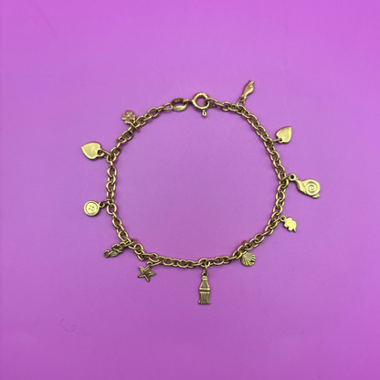 14k cutesy charm bracelet 7"