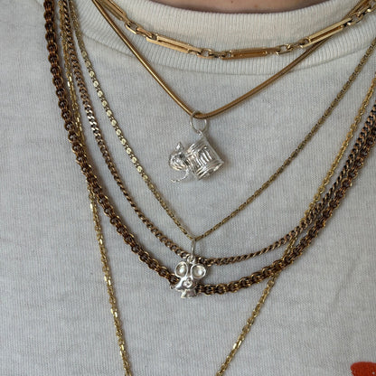 silver trash cat charm