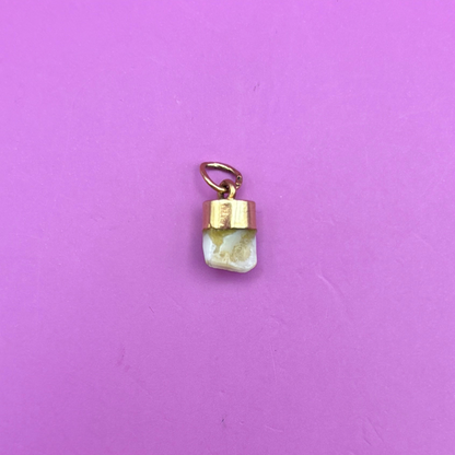 18k baby tooth charm