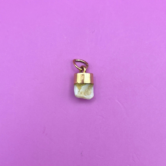 18k baby tooth charm