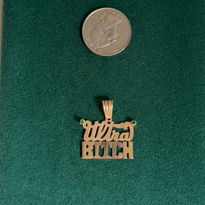 14k ultra bitch with emeralds charm