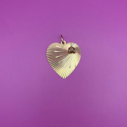 14k engine turned heart with yellow spinel charm