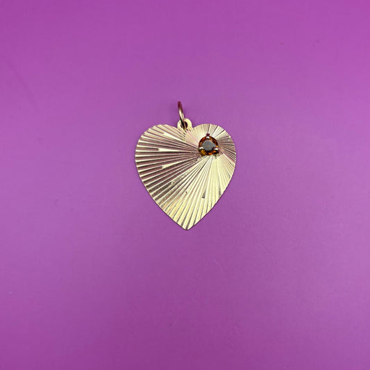 14k engine turned heart with yellow spinel charm