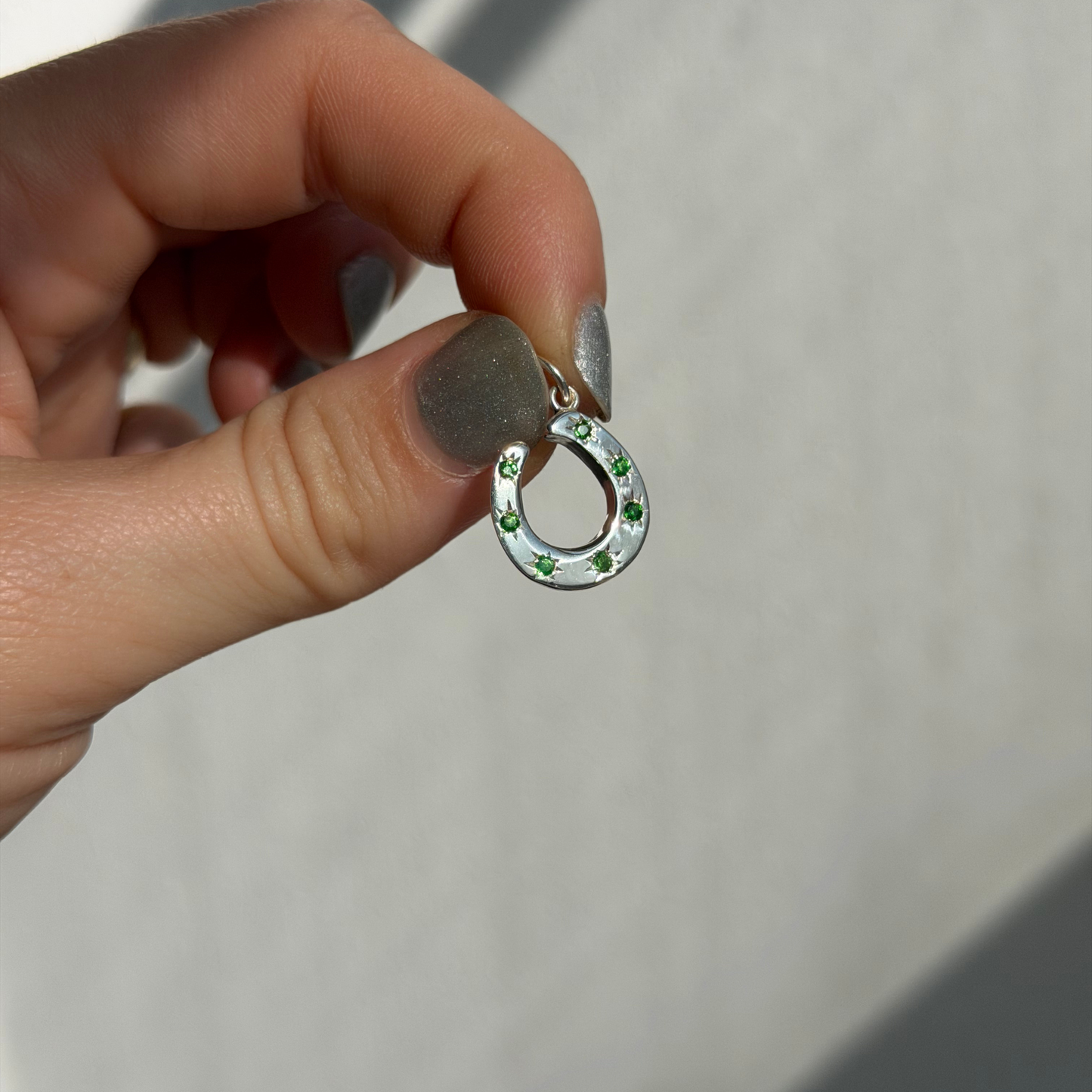 silver 7 tsavorite stars horseshoe charm