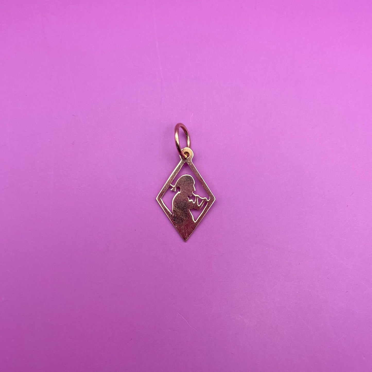 18k meso woman with flute charm