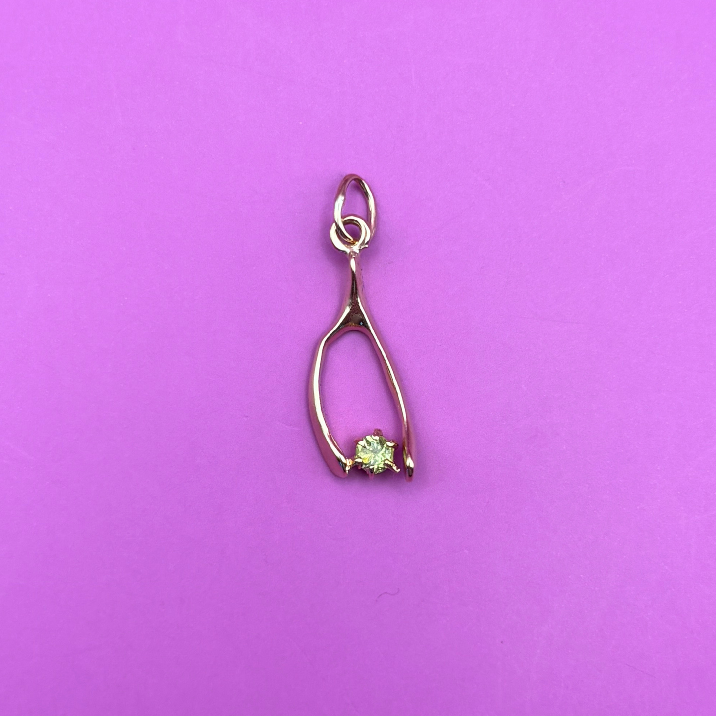 14k wishbone with peridot charm