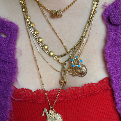 14k pisces cut out scallop charm