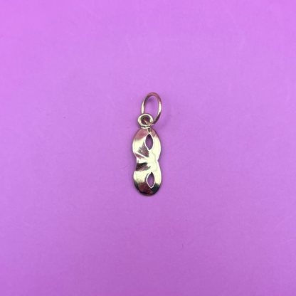 14k eyes wide shut charm