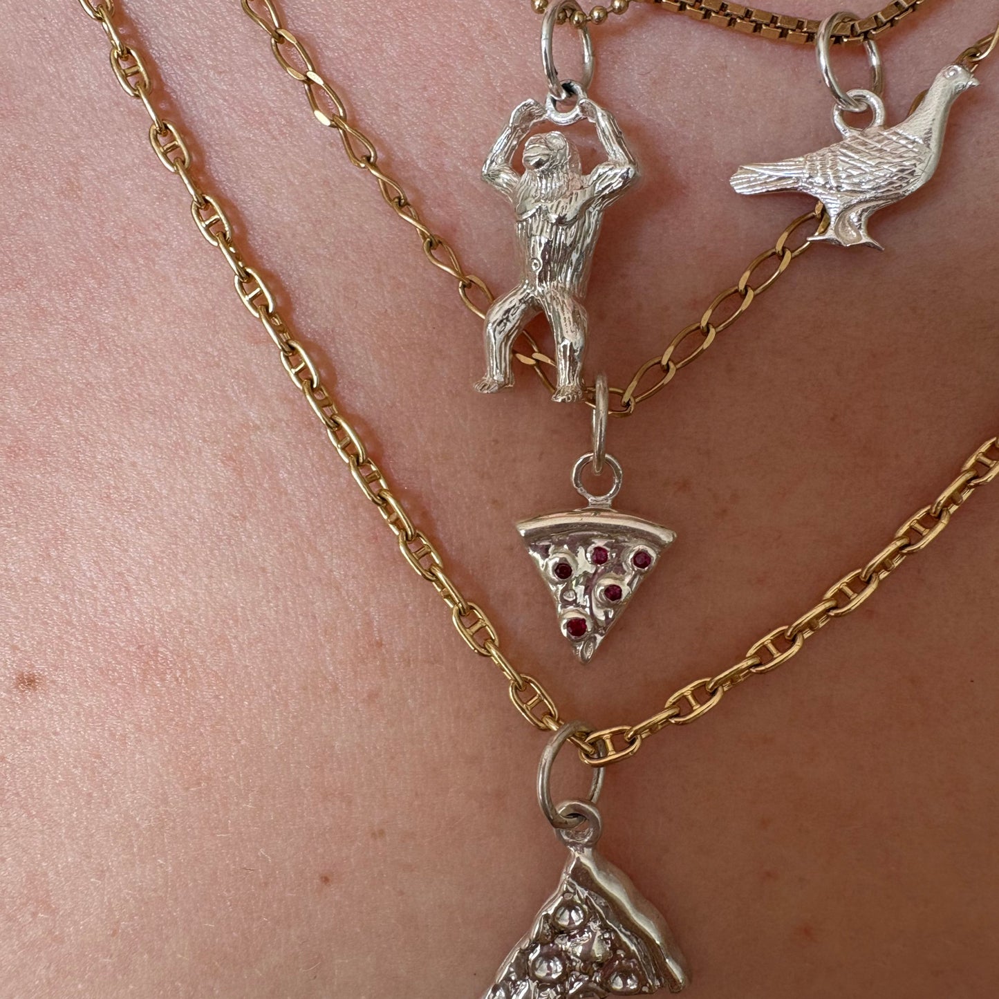 silver pizza with ruby pepperonis charm