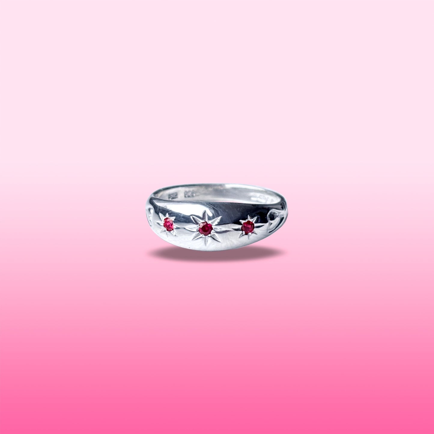 silver ruby star set dome ring