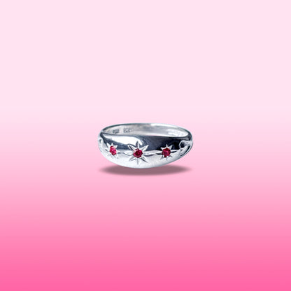 silver ruby star set dome ring