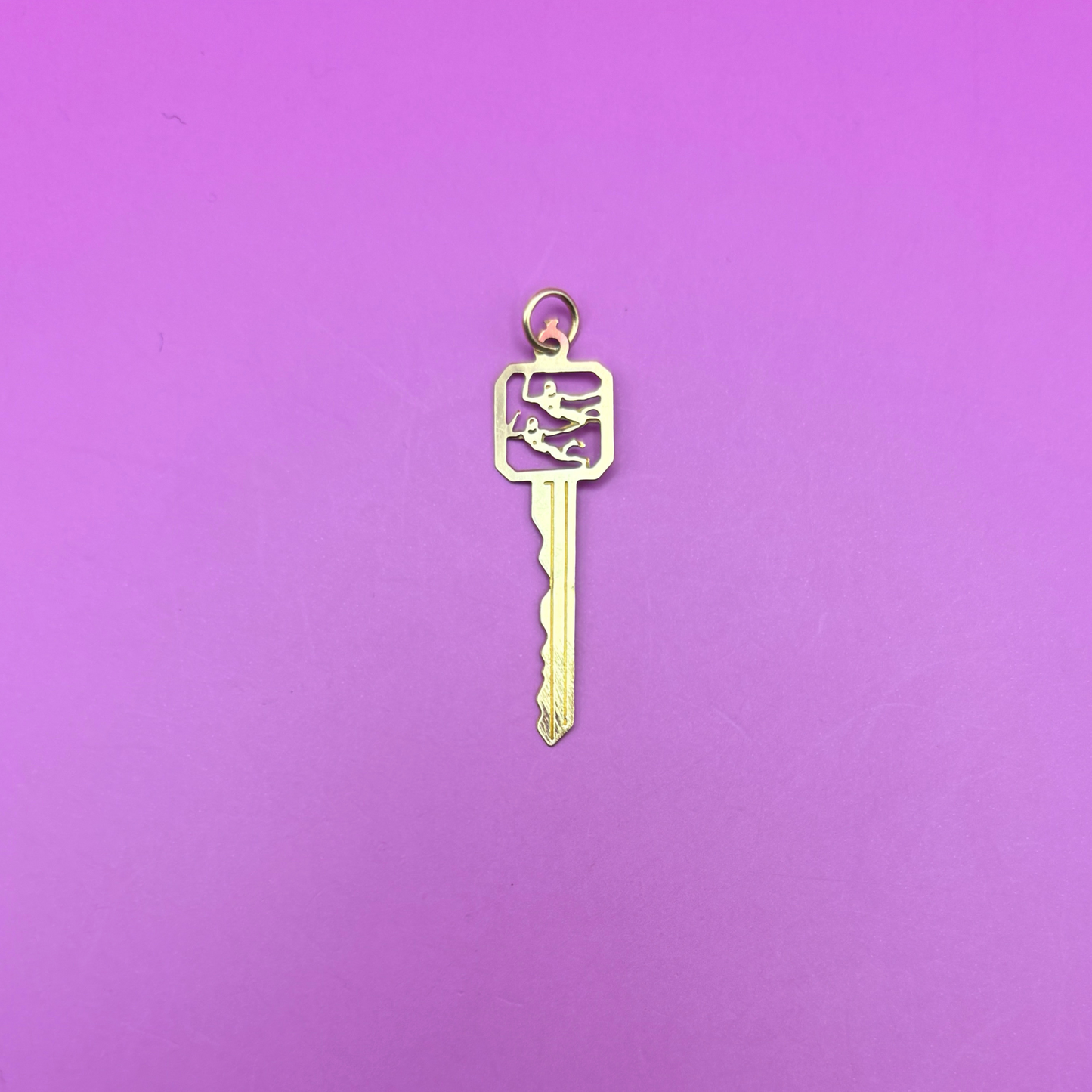 14k gemini key charm