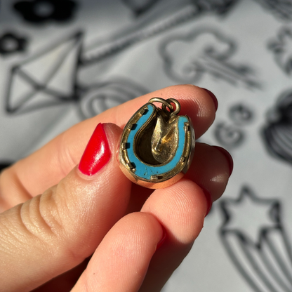 9k horseshoe with blue enamel locket