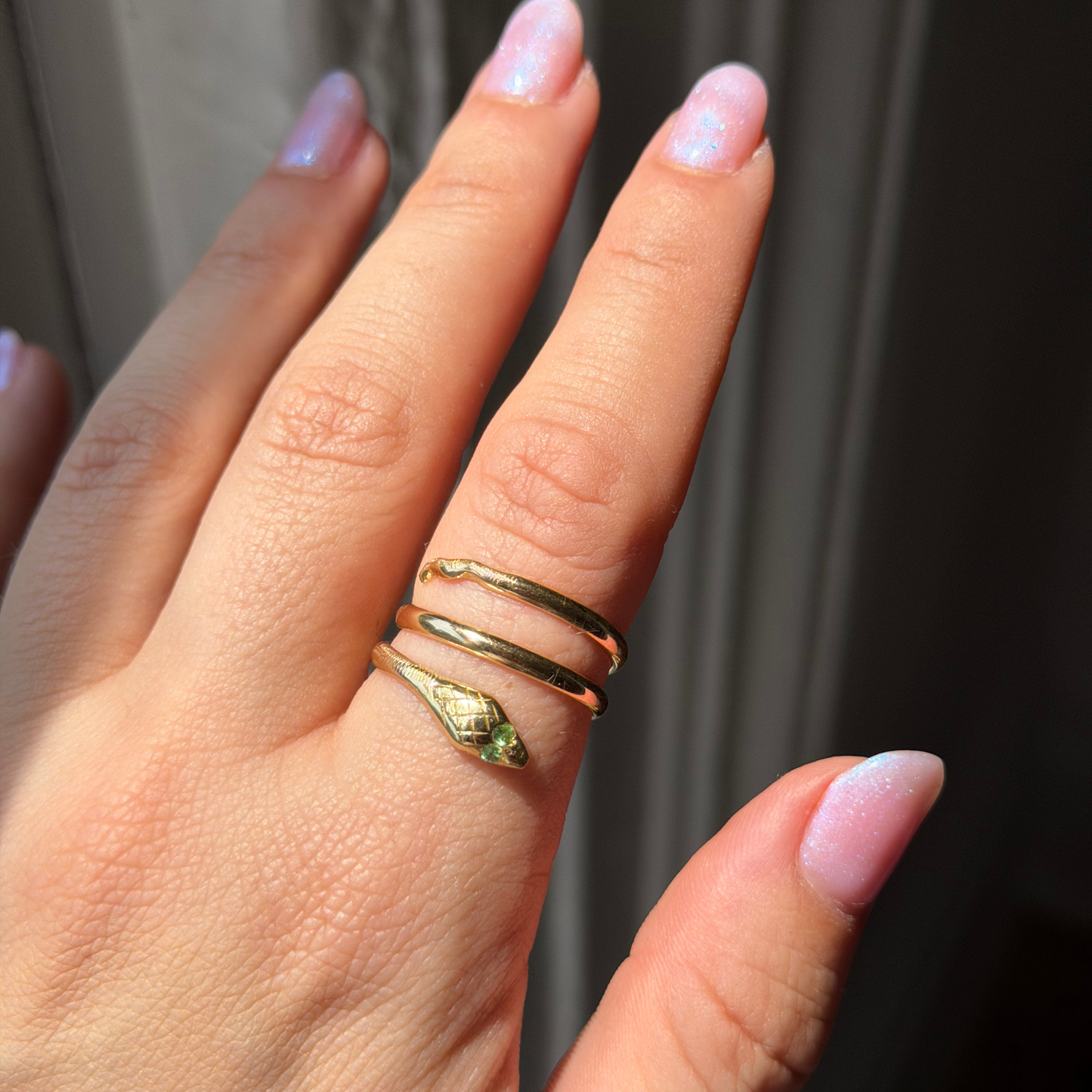 18k wrap around snake ring with tsavorite eyes