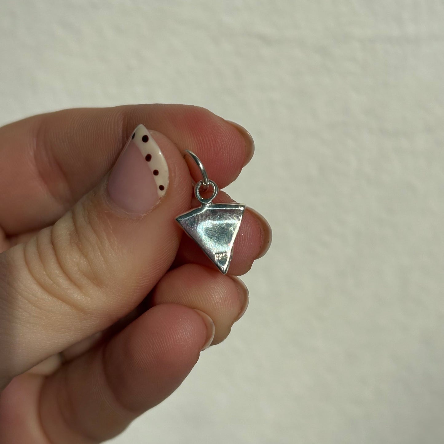 silver pizza with ruby pepperonis charm